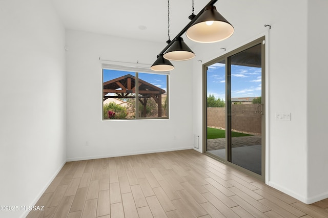 12513 Denton Way, Marana, AZ 85653 - unfurnished room with wood finished floors and baseboards