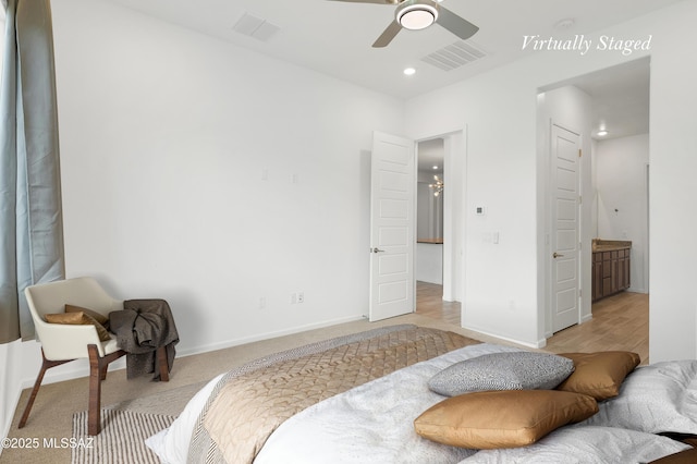 12513 Denton Way, Marana, AZ 85653 - bedroom featuring baseboards, connected bathroom, and recessed lighting