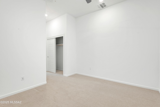 12513 Denton Way, Marana, AZ 85653 - unfurnished bedroom with light carpet, baseboards, a closet, recessed lighting, and ceiling fan