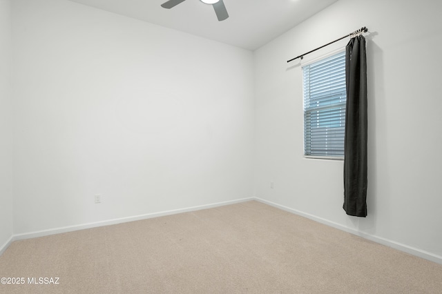 12513 Denton Way, Marana, AZ 85653 - unfurnished room featuring light colored carpet, ceiling fan, and baseboards