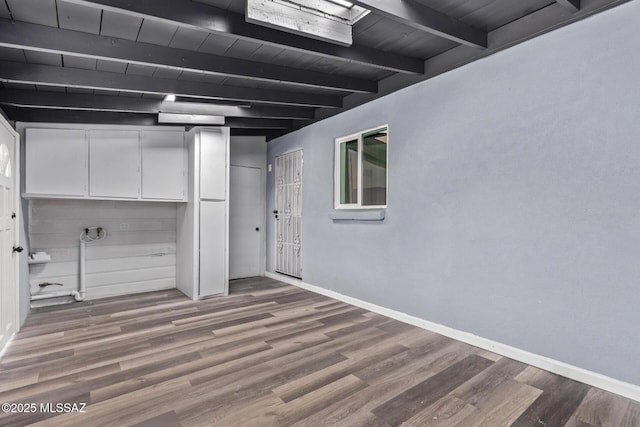 1025 E Windsor St, Tucson, AZ 85719 - finished below grade area featuring baseboards, wood finished floors, and wooden ceiling