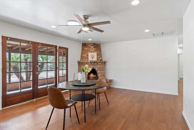 1241 W Cananea Cir, Tucson, AZ 85704 - dining space featuring french doors, a ceiling fan, wood finished floors, baseboards, and recessed lighting