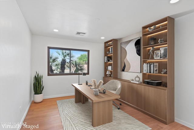 1241 W Cananea Cir, Tucson, AZ 85704 - home office with light wood-style floors, baseboards, and recessed lighting