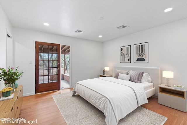 1241 W Cananea Cir, Tucson, AZ 85704 - bedroom featuring access to exterior, light wood-style floors, recessed lighting, and baseboards
