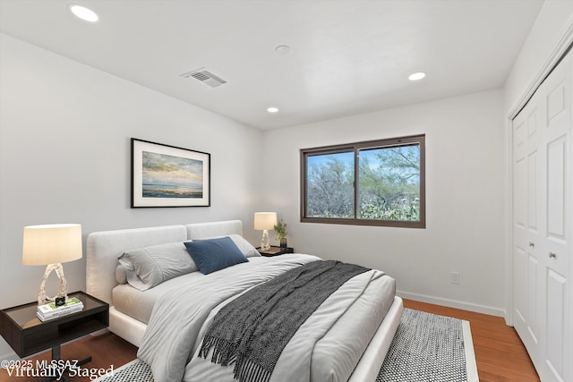 1241 W Cananea Cir, Tucson, AZ 85704 - bedroom with a closet, baseboards, recessed lighting, and wood finished floors