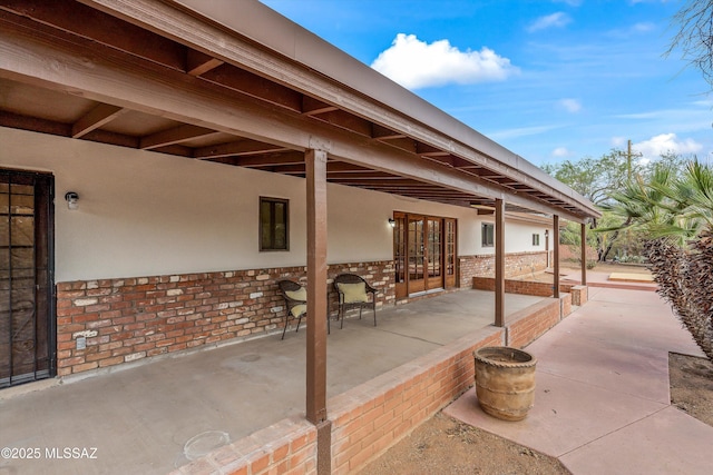 1241 W Cananea Cir, Tucson, AZ 85704 - view of patio / terrace with french doors