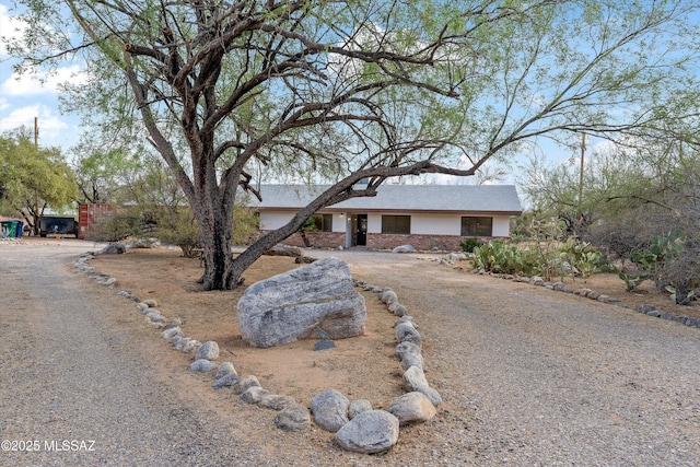 1241 W Cananea Cir, Tucson, AZ 85704 - view of front of property featuring driveway and stucco siding