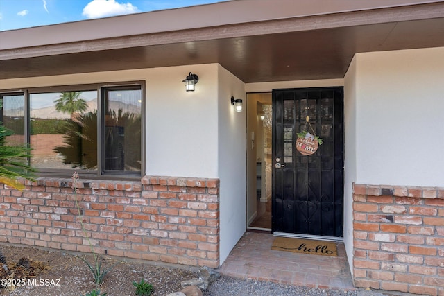 1241 W Cananea Cir, Tucson, AZ 85704 - property entrance with stucco siding and brick siding