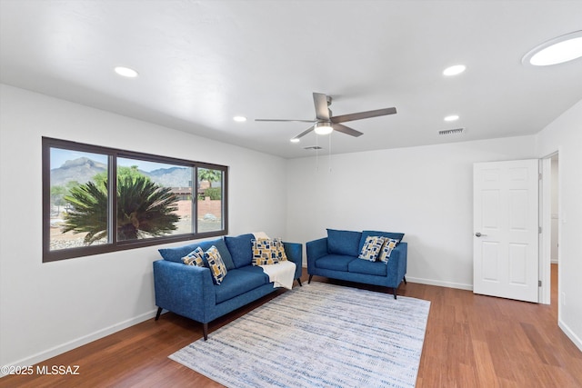 1241 W Cananea Cir, Tucson, AZ 85704 - living area featuring wood finished floors, a ceiling fan, recessed lighting, and baseboards