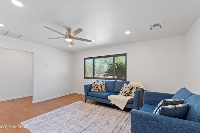 1241 W Cananea Cir, Tucson, AZ 85704 - living room with wood finished floors, recessed lighting, baseboards, ceiling fan, and attic access