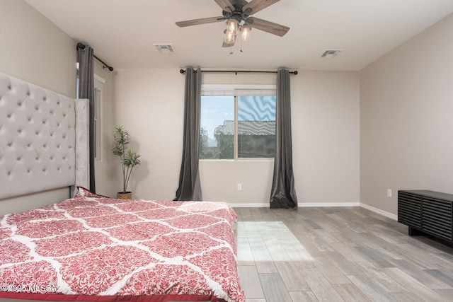8040 N Desert Gum Dr, Tucson, AZ 85741 - bedroom featuring wood finished floors and baseboards