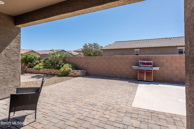 8040 N Desert Gum Dr, Tucson, AZ 85741 - view of patio / terrace featuring grilling area and a fenced backyard