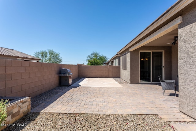 8040 N Desert Gum Dr, Tucson, AZ 85741 - view of patio / terrace featuring a fenced backyard and a ceiling fan