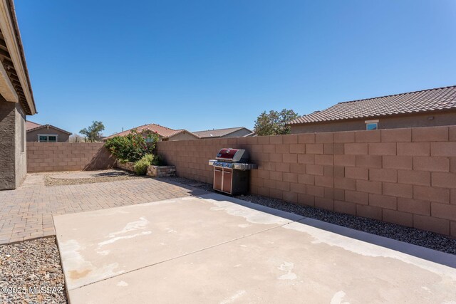 8040 N Desert Gum Dr, Tucson, AZ 85741 - view of patio / terrace with a fenced backyard and area for grilling