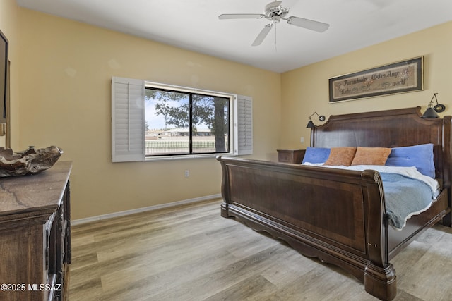 140 E Paseo De Golf, Green Valley, AZ 85614 - bedroom featuring light wood finished floors, baseboards, and ceiling fan