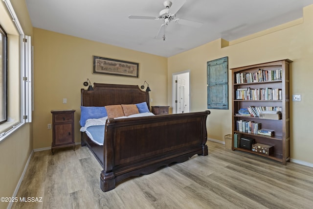140 E Paseo De Golf, Green Valley, AZ 85614 - bedroom with light wood-style flooring, baseboards, and ceiling fan