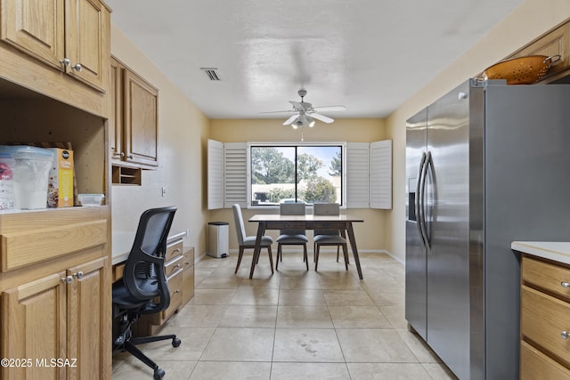 140 E Paseo De Golf, Green Valley, AZ 85614 - kitchen featuring stainless steel fridge, a ceiling fan, an office area, baseboards, and light tile patterned flooring