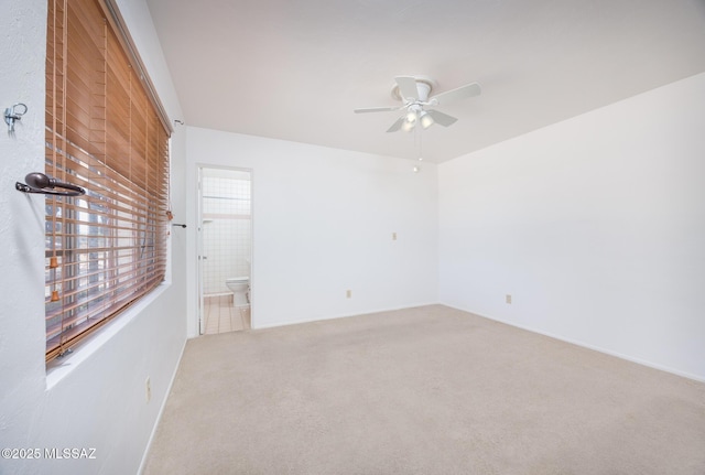 5449 E Rosewood St, Tucson, AZ 85711 - empty room featuring a ceiling fan and carpet flooring