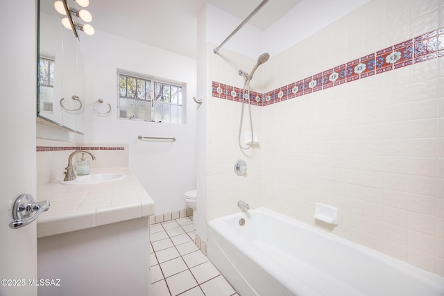 5449 E Rosewood St, Tucson, AZ 85711 - full bath featuring shower / tub combination, toilet, vanity, and tile patterned floors