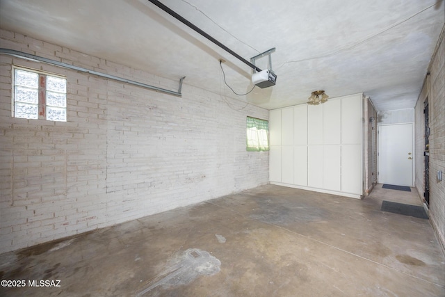 5449 E Rosewood St, Tucson, AZ 85711 - garage featuring a garage door opener