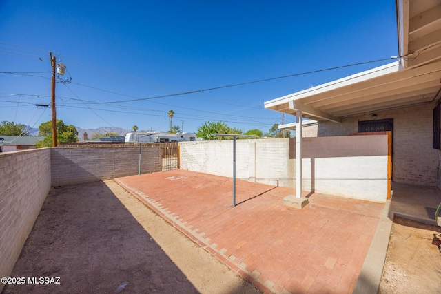 5449 E Rosewood St, Tucson, AZ 85711 - fenced backyard with a patio area