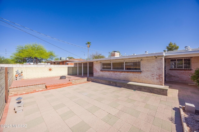 5449 E Rosewood St, Tucson, AZ 85711 - fenced backyard with a patio