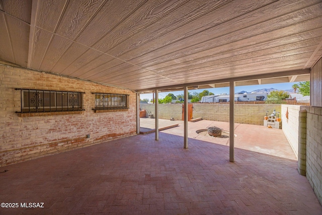 5449 E Rosewood St, Tucson, AZ 85711 - fenced backyard featuring a patio area