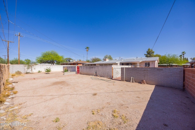 5449 E Rosewood St, Tucson, AZ 85711 - fenced yard featuring a gate