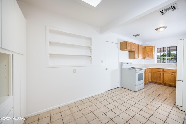 5449 E Rosewood St, Tucson, AZ 85711 - kitchen featuring white appliances, light countertops, beam ceiling, brown cabinetry, and built in shelves