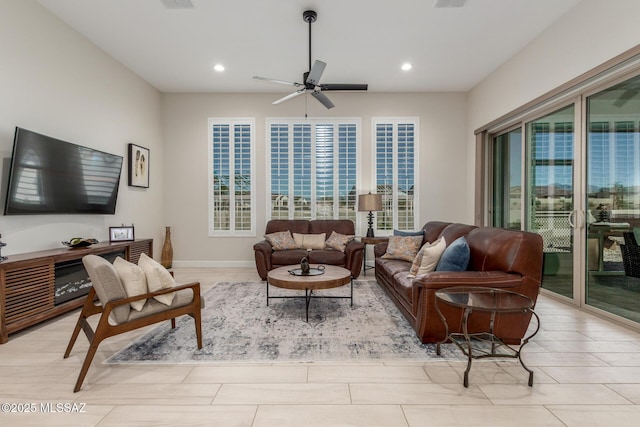 1936 N Star Vw Ln, Green Valley, AZ 85614 - living area featuring ceiling fan, recessed lighting, and baseboards