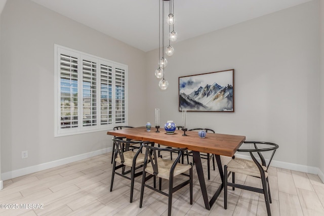 1936 N Star Vw Ln, Green Valley, AZ 85614 - dining area featuring baseboards and light wood finished floors