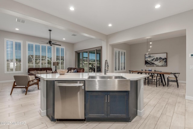 1936 N Star Vw Ln, Green Valley, AZ 85614 - kitchen with stainless steel dishwasher, a sink, light countertops, baseboards, and open floor plan
