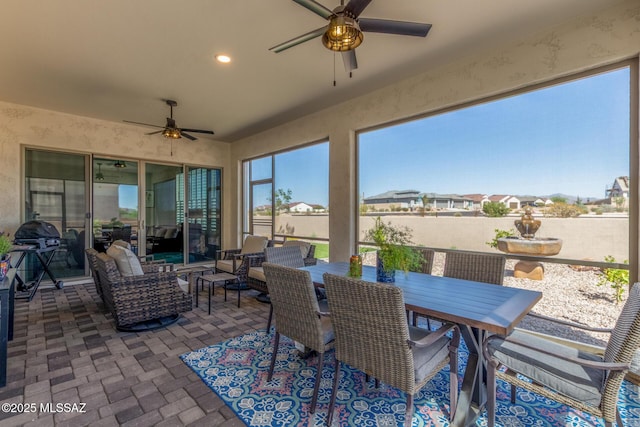 1936 N Star Vw Ln, Green Valley, AZ 85614 - view of patio featuring a ceiling fan, fence, outdoor dining area, and outdoor lounge area