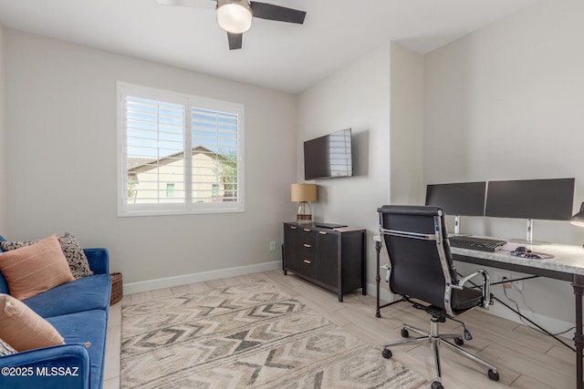 1936 N Star Vw Ln, Green Valley, AZ 85614 - home office with a ceiling fan, baseboards, and light wood-type flooring