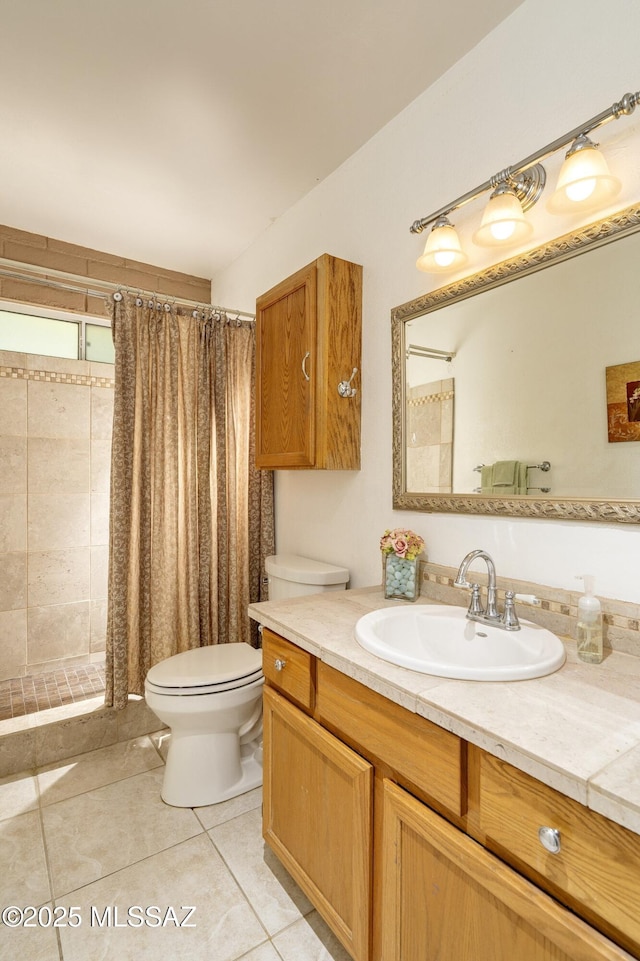 3600 N Hash Knife Cir, Tucson, AZ 85749 - full bath featuring toilet, tiled shower, tile patterned flooring, and vanity