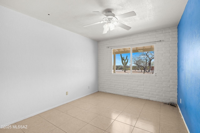 3600 N Hash Knife Cir, Tucson, AZ 85749 - spare room with a ceiling fan, baseboards, and light tile patterned flooring