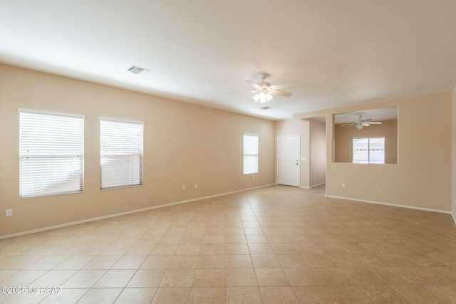 15815 S Via Cayetano, Sahuarita, AZ 85629 - unfurnished room with a ceiling fan and baseboards