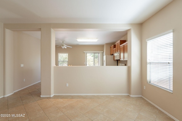 15815 S Via Cayetano, Sahuarita, AZ 85629 - unfurnished room featuring a ceiling fan, light tile patterned floors, and baseboards