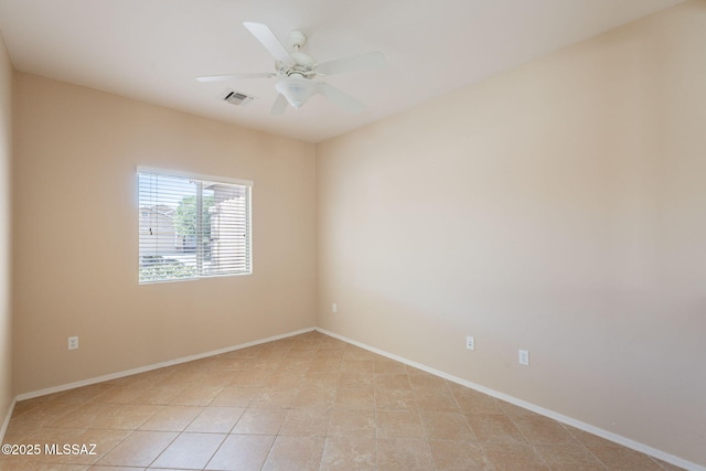 15815 S Via Cayetano, Sahuarita, AZ 85629 - spare room with baseboards and ceiling fan