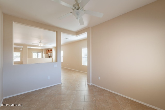 15815 S Via Cayetano, Sahuarita, AZ 85629 - unfurnished room featuring a ceiling fan, baseboards, and light tile patterned flooring