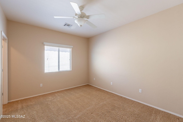 15815 S Via Cayetano, Sahuarita, AZ 85629 - unfurnished room featuring light colored carpet, ceiling fan, and baseboards