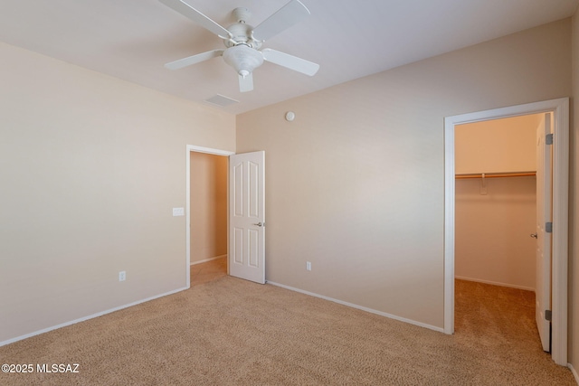 15815 S Via Cayetano, Sahuarita, AZ 85629 - unfurnished bedroom featuring carpet floors, a spacious closet, and baseboards