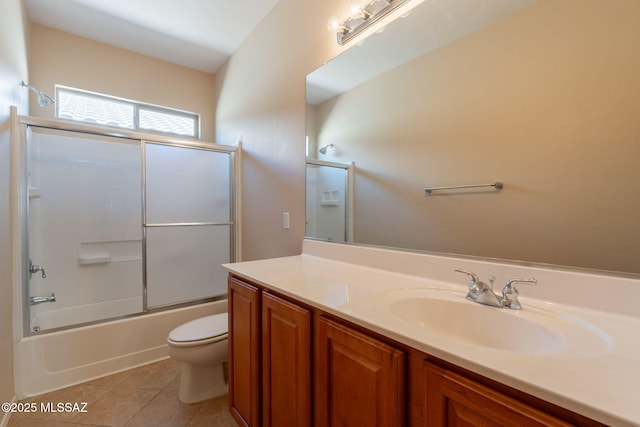 15815 S Via Cayetano, Sahuarita, AZ 85629 - bathroom featuring toilet, tile patterned flooring, vanity, and shower / tub combination