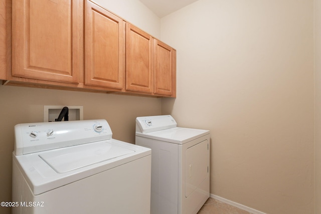 15815 S Via Cayetano, Sahuarita, AZ 85629 - laundry room featuring washer and clothes dryer, cabinet space, and baseboards