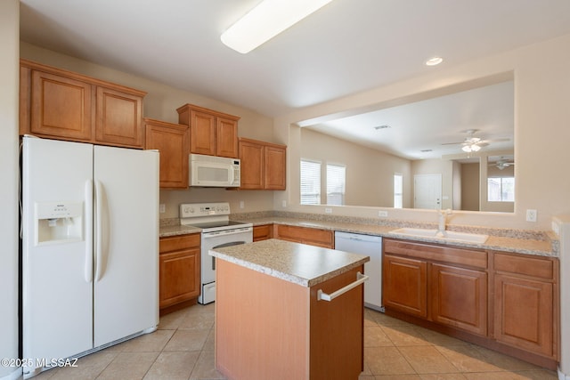 15815 S Via Cayetano, Sahuarita, AZ 85629 - kitchen with white appliances, a sink, light tile patterned floors, light countertops, and recessed lighting