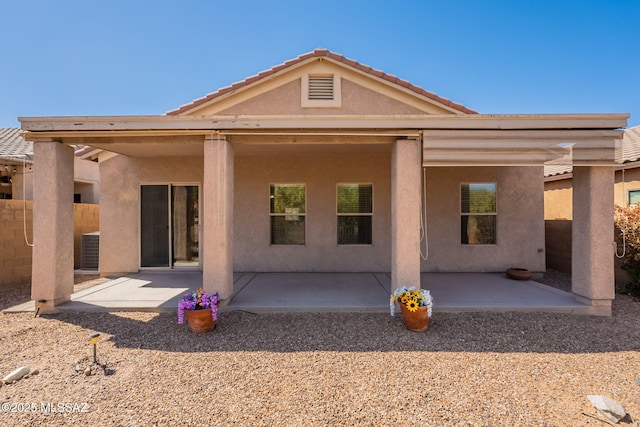 15815 S Via Cayetano, Sahuarita, AZ 85629 - rear view of property with a patio, stucco siding, central AC unit, and fence