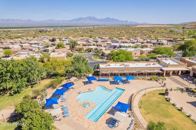 15815 S Via Cayetano, Sahuarita, AZ 85629 - aerial perspective of suburban area with a pool area and a mountain backdrop