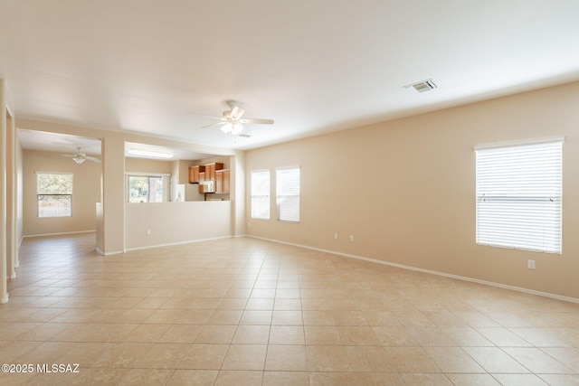 15815 S Via Cayetano, Sahuarita, AZ 85629 - unfurnished room with a ceiling fan, baseboards, and light tile patterned floors
