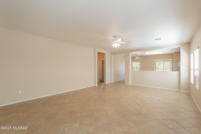 15815 S Via Cayetano, Sahuarita, AZ 85629 - unfurnished room featuring a ceiling fan and baseboards