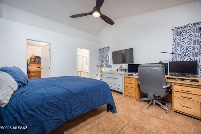 2804 W Camino Ebano, Tucson, AZ 85742 - bedroom featuring vaulted ceiling, light tile patterned floors, an office area, ceiling fan, and ensuite bath